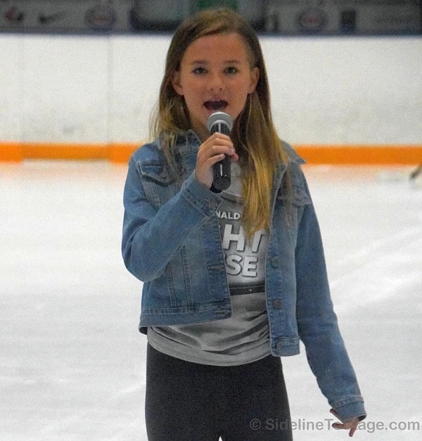 Anthem singer, Sienna Rose Kocsis performs the Canadian National Anthem.